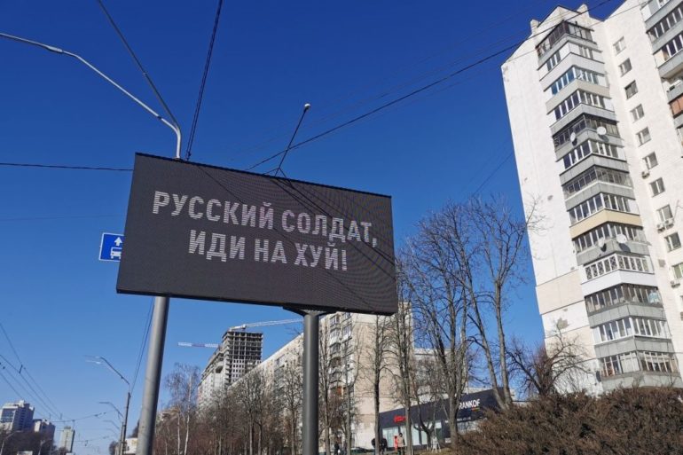 A sign on a pole
