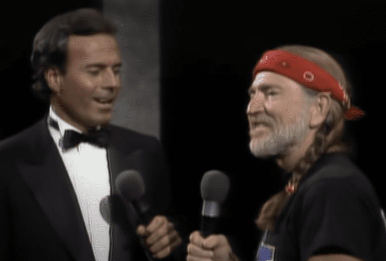 Willie Nelson, Julio Iglesias are posing for a picture