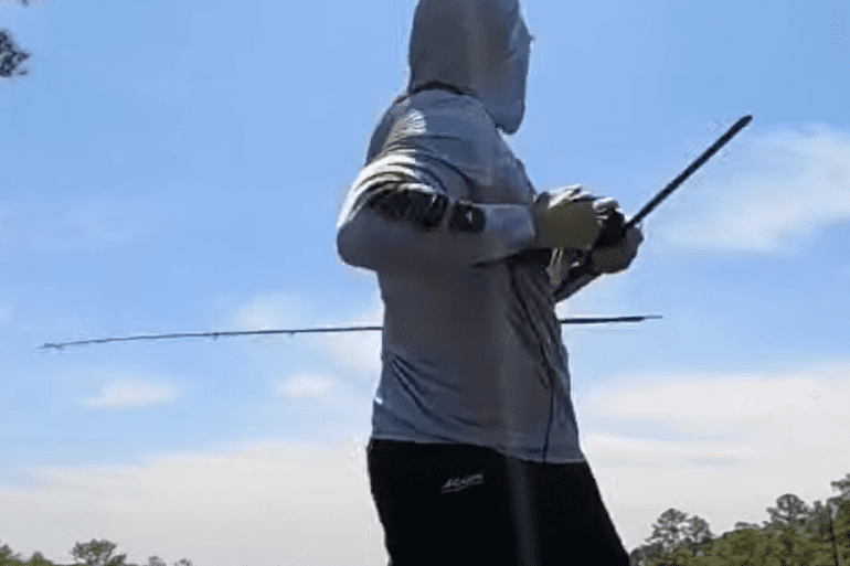 Bass fisherman snaps rod