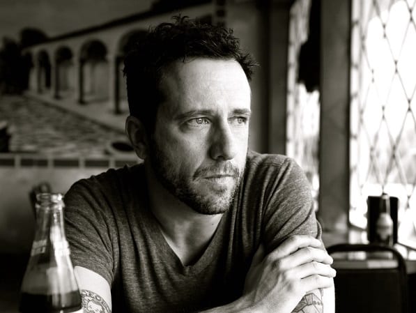 Will Hoge sitting at a table