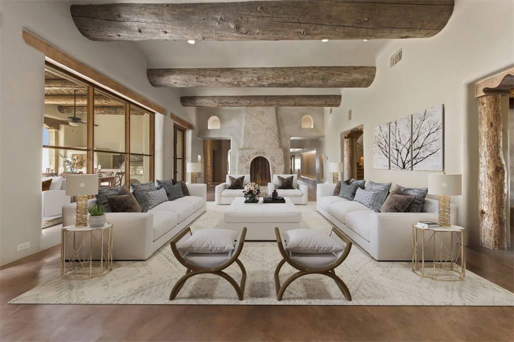 A living room with a large open floor plan